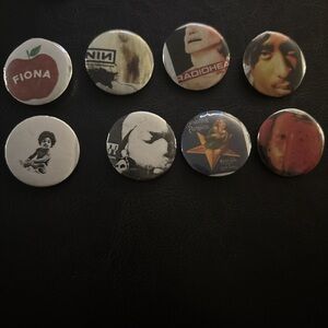 Buttons Collection with Red, Black, and White Designs